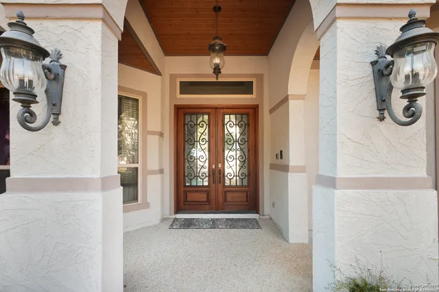 a view of an empty room with garage and garage