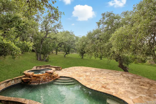 a view of a lake with a yard