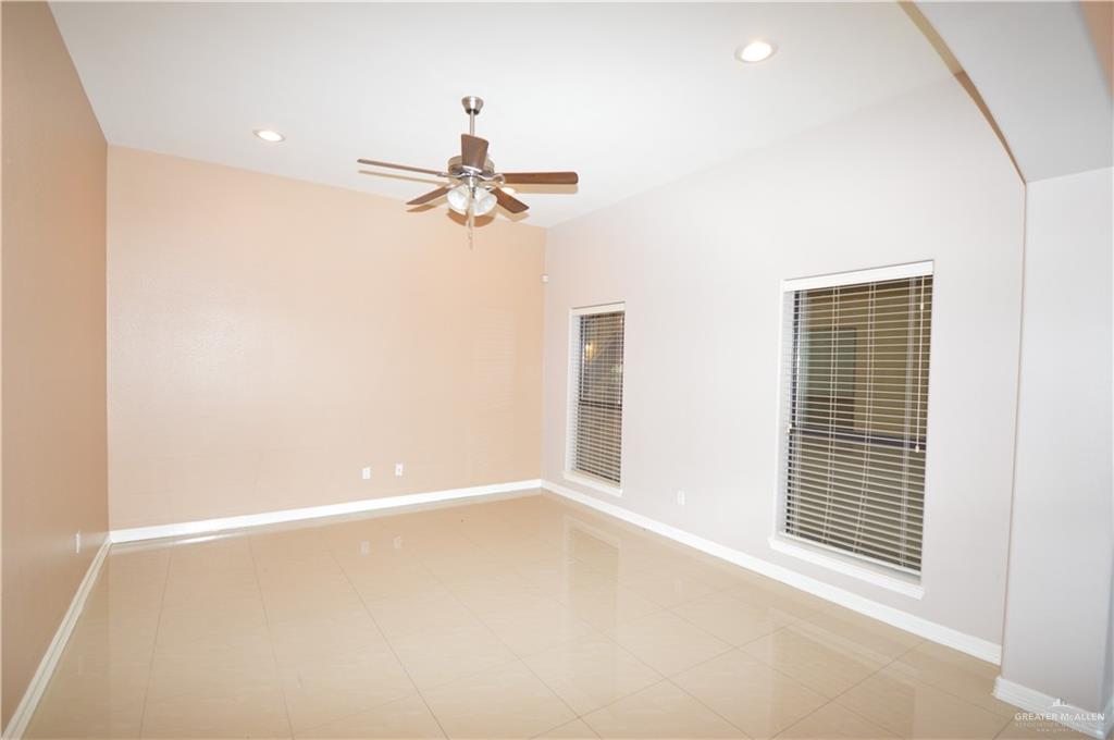 2705 Mimosa Street, Unit 2 Mission, TX 78574 - Photo 12 of 27 Family area with ceiling fan, windows and recess lights