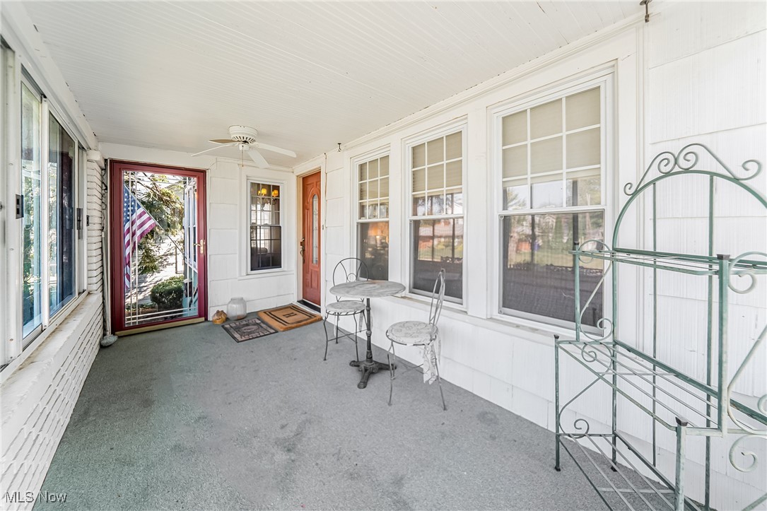 1104 Waverly Road Sandusky, OH 44870 - Photo 7 of 46 Unfurnished sunroom featuring ceiling fan