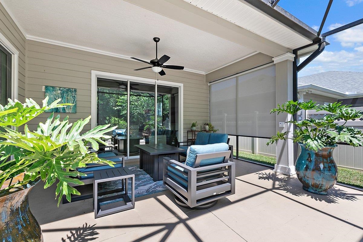 331 Athens Drive St. Augustine, FL 32092 - Photo 16 of 24 a outdoor living space with patio furniture and potted plants