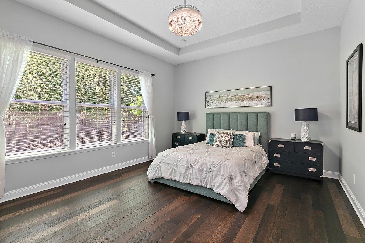 331 Athens Drive St. Augustine, FL 32092 - Photo 10 of 24 a bedroom with a bed and a large window