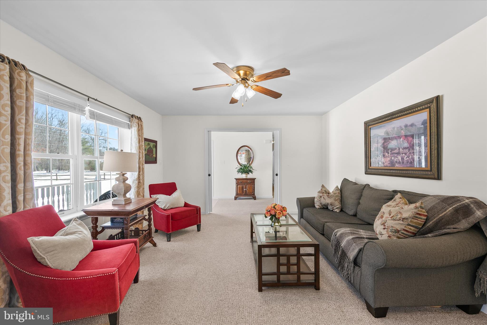 24618 Peterkins Road Georgetown, DE 19947 - Photo 11 of 47 a living room with furniture and a large window