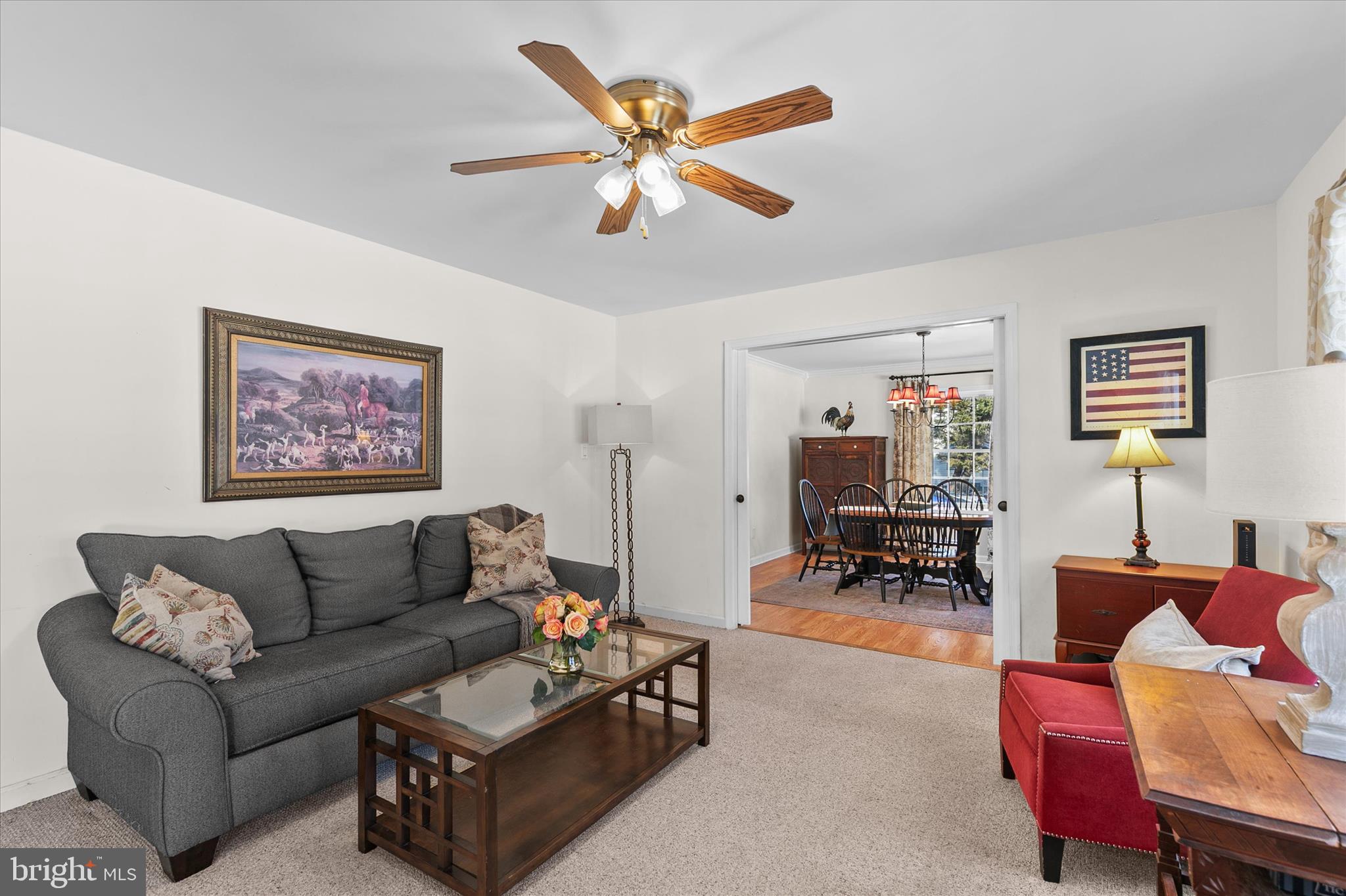24618 Peterkins Road Georgetown, DE 19947 - Photo 13 of 47 a living room with furniture and a ceiling fan