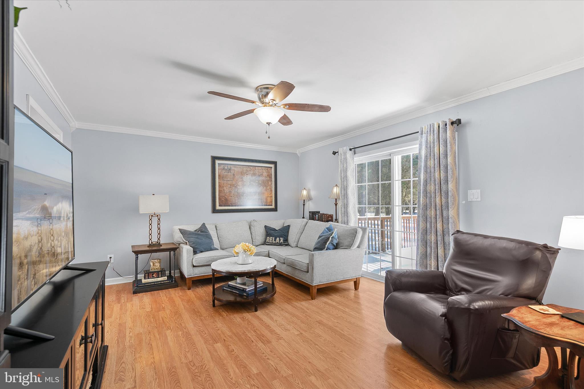24618 Peterkins Road Georgetown, DE 19947 - Photo 18 of 47 a living room with furniture and a large window
