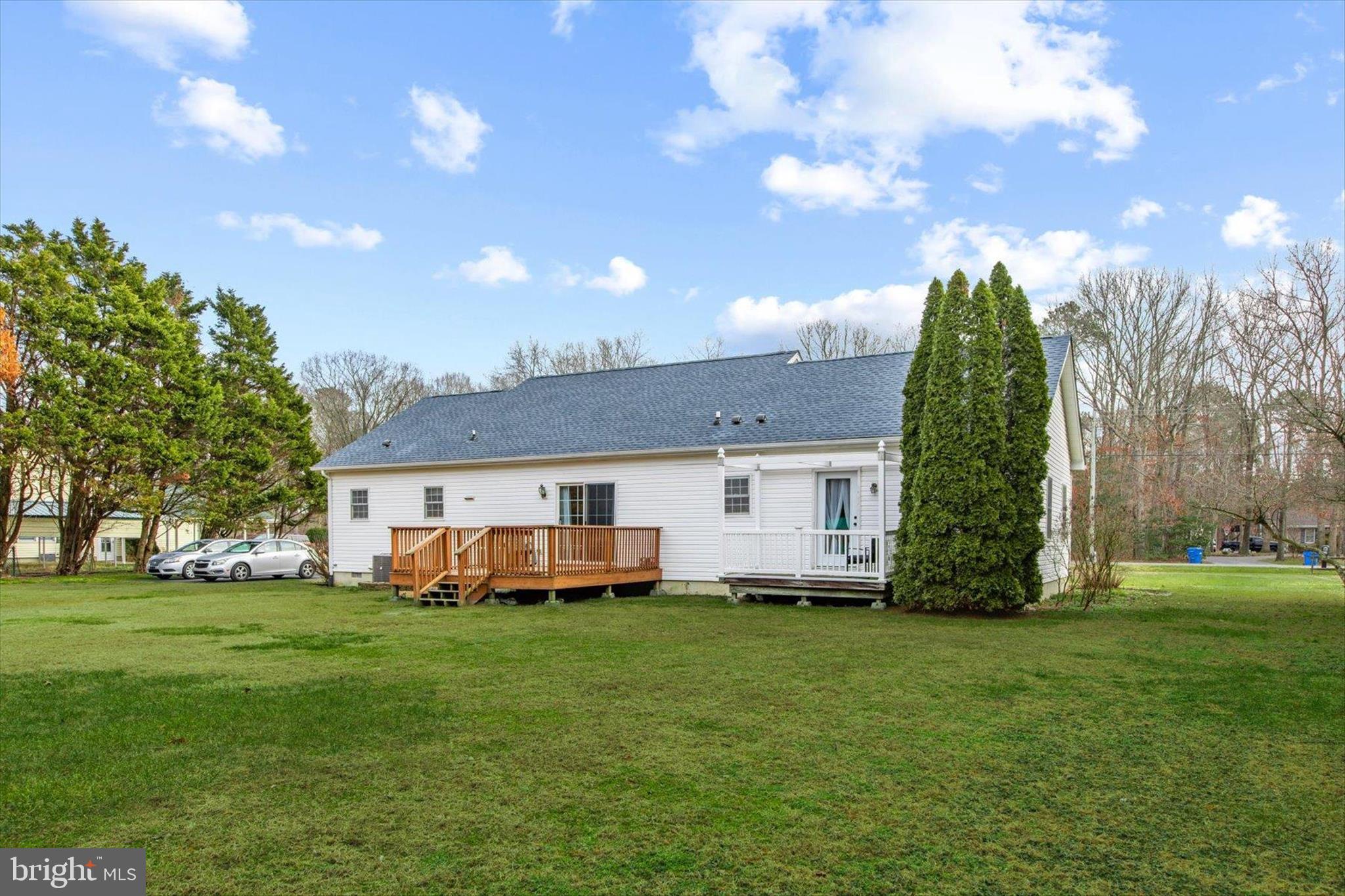 24618 Peterkins Road Georgetown, DE 19947 - Photo 45 of 47 a view of a house with a backyard