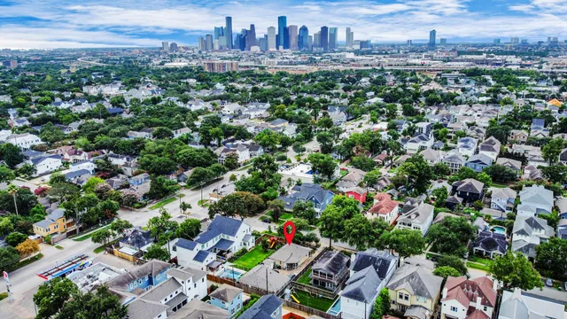 an aerial view of a city with lots of residential buildings