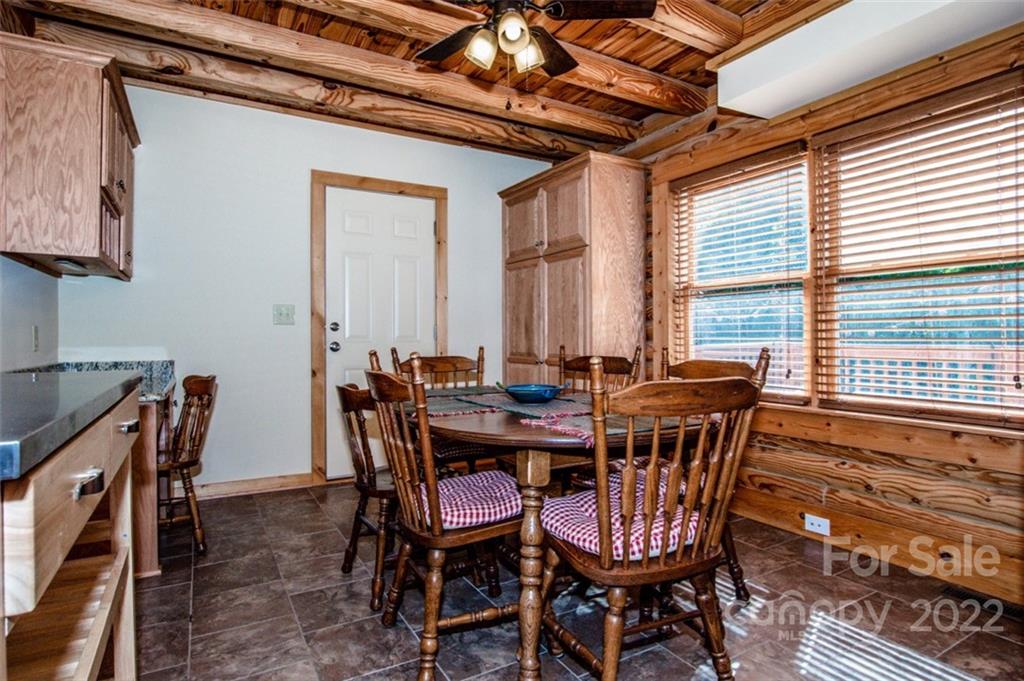 133 Folkstone Road, Unit 2 Mooresville, NC 28117 - Photo 14 of 32 a view of a dining room with furniture and window