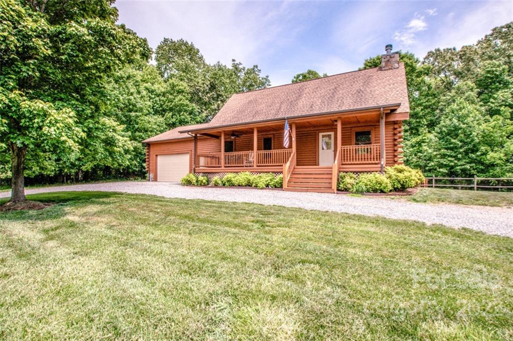 133 Folkstone Road, Unit 2 Mooresville, NC 28117 - Photo 2 of 32 a front view of a house with garden