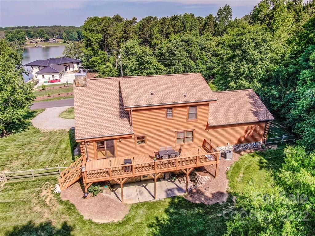 133 Folkstone Road, Unit 2 Mooresville, NC 28117 - Photo 4 of 32 an aerial view of a house with swimming pool and garden