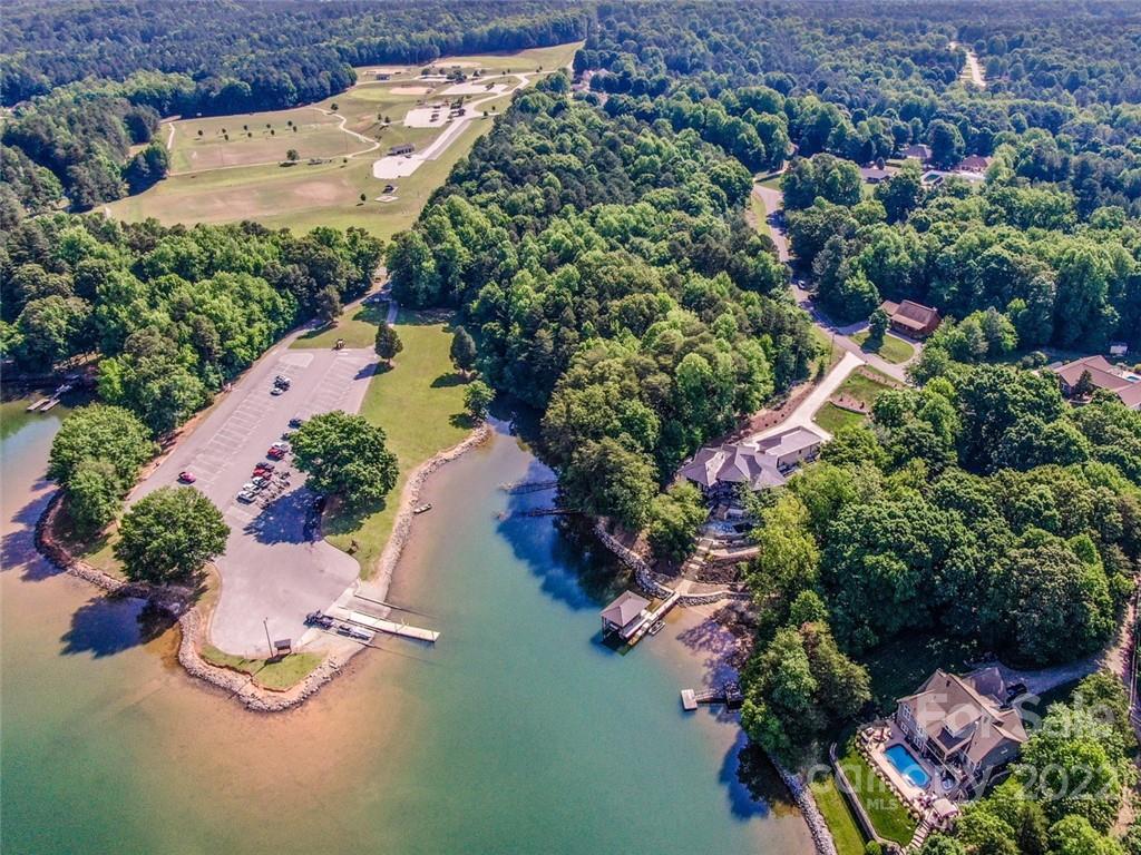 133 Folkstone Road, Unit 2 Mooresville, NC 28117 - Photo 6 of 32 an aerial view of a house with a garden and swimming pool