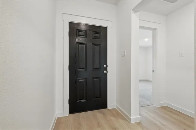 wooden floor with cabinet