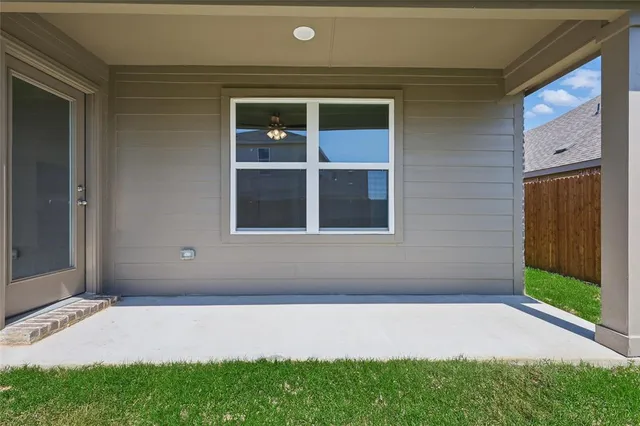 a view of an empty room and closet area
