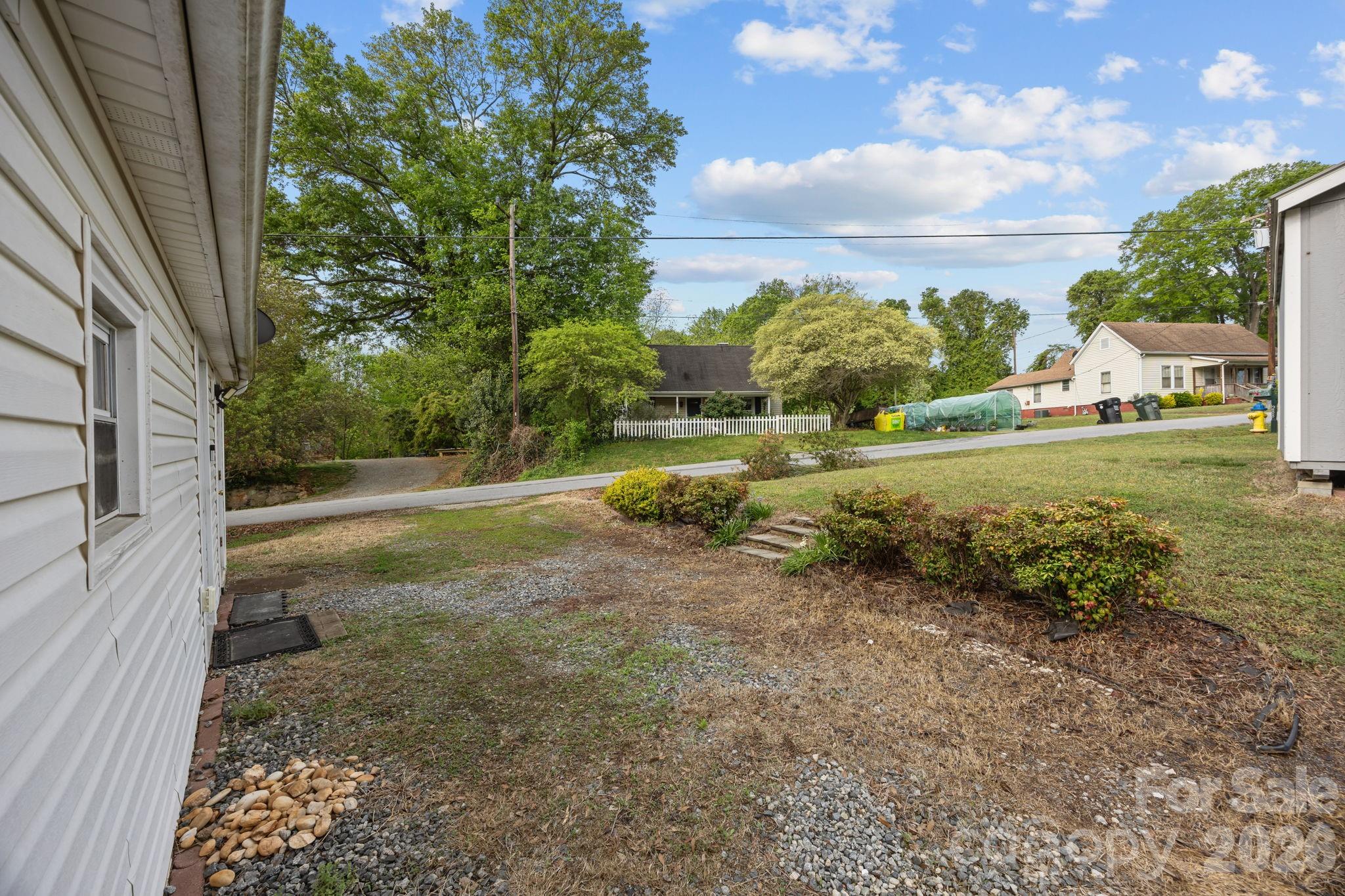 708 Old Charlotte Road Southwest Concord, NC 28027 - Photo 31 of 35 a view of a backyard