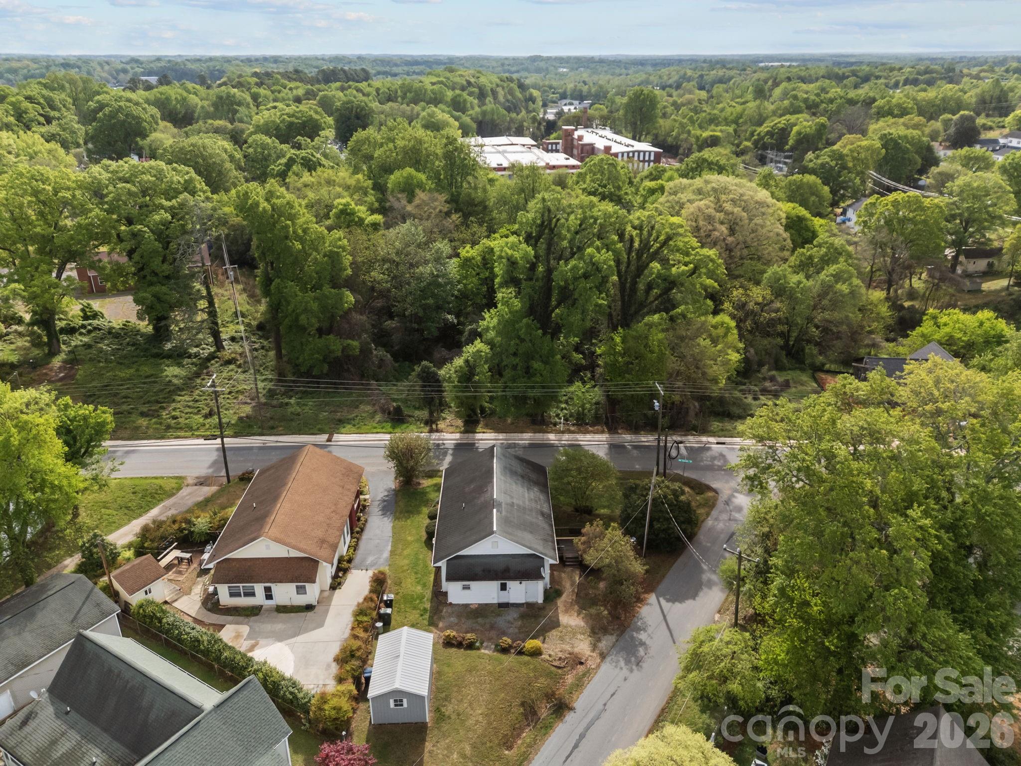 708 Old Charlotte Road Southwest Concord, NC 28027 - Photo 33 of 35 an aerial view of a house with a yard