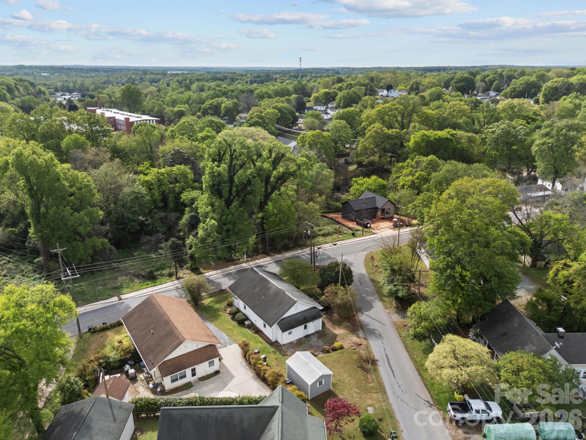 708 Old Charlotte Road Southwest Concord, NC 28027 - Photo 34 of 35 an aerial view of a house with a yard