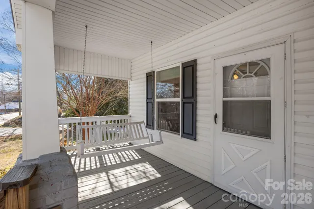 a view of porch with furniture