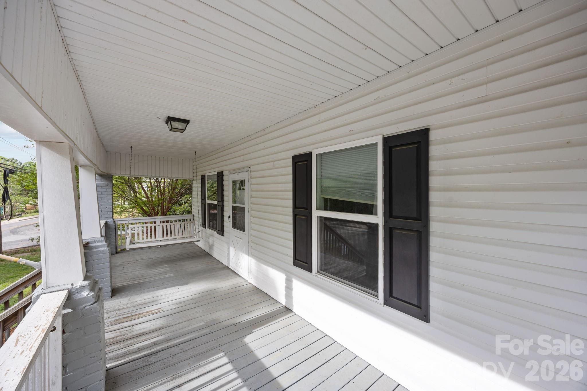 708 Old Charlotte Road Southwest Concord, NC 28027 - Photo 5 of 35 a view of a porch
