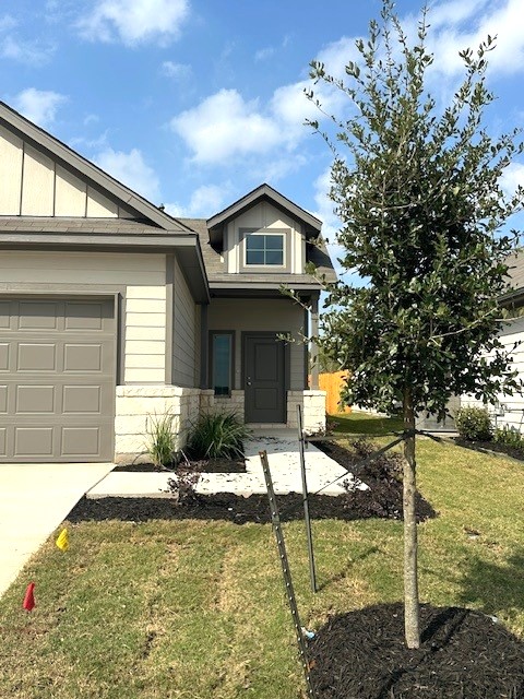 143 Tolo Drive Elgin, TX 78621 - Photo 2 of 30 a view of a house with backyard and sitting area