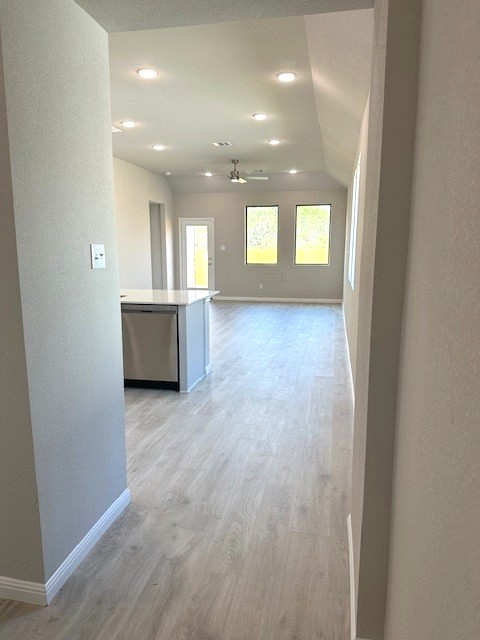 143 Tolo Drive Elgin, TX 78621 - Photo 3 of 30 an empty room with kitchen and windows
