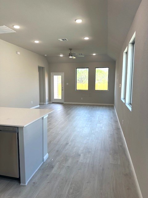 143 Tolo Drive Elgin, TX 78621 - Photo 7 of 30 a view of an empty room with window and wooden floor