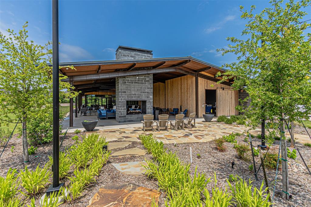 116 Derrett Lane Rhome, TX 76078 - Photo 28 of 30 a view of a dinning table and chairs in patio