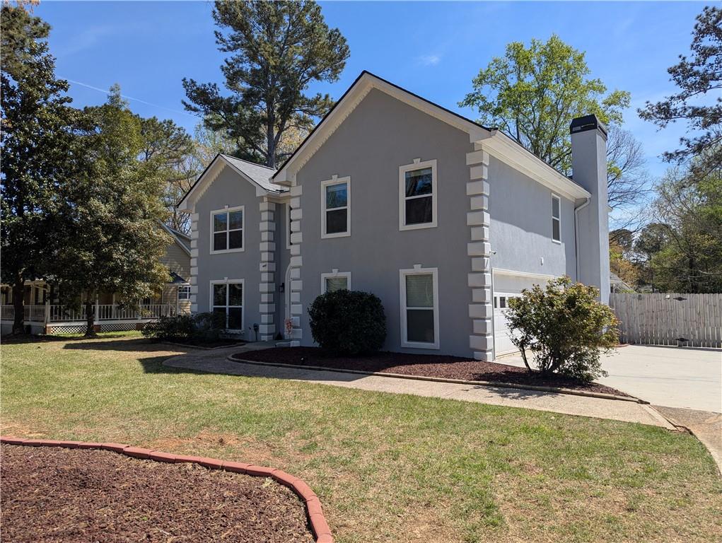 4255 Prestley Mill Road Douglasville, GA 30135 - Photo 2 of 43 a front view of a house with a yard