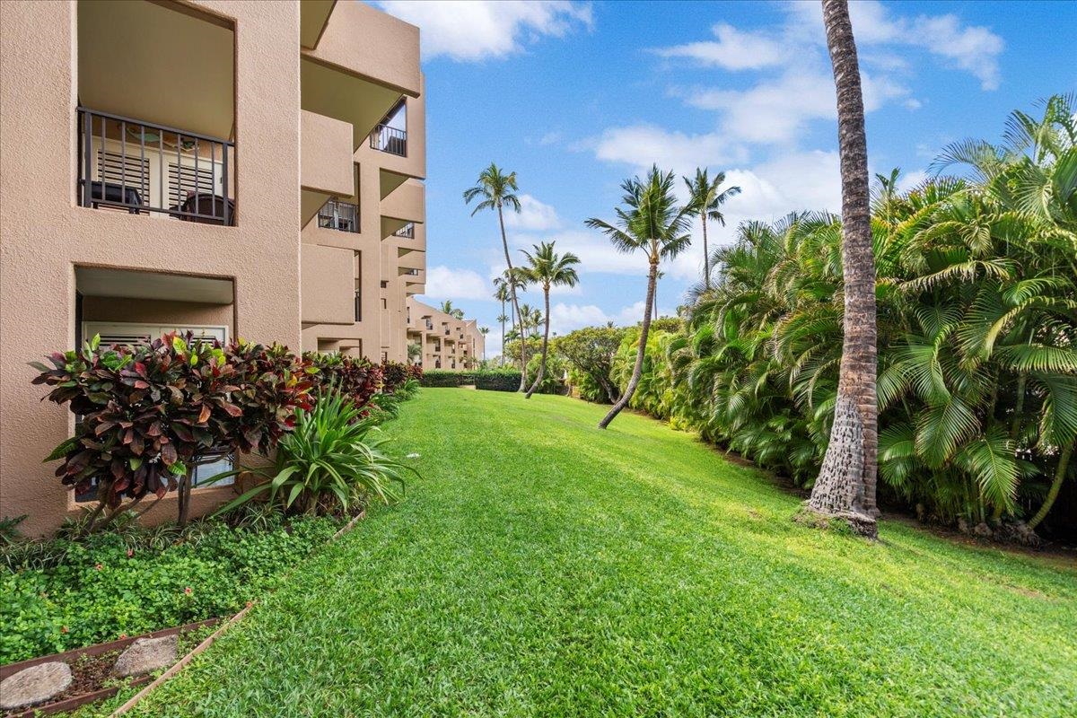2695 South Kihei Road, Unit 6109 Kihei, HI 96753 - Photo 15 of 49 a view of a house with a yard