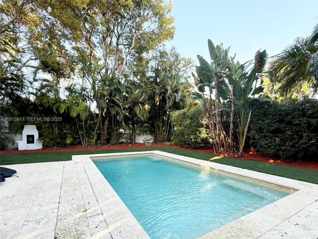 a bathroom with a bathtub and a sink