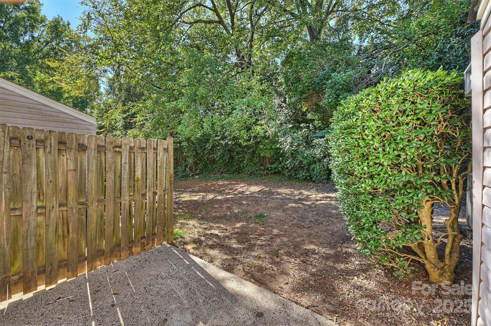 951 Hollywood Street, Unit F Charlotte, NC 28211 - Photo 30 of 42 a view of a backyard with pathway