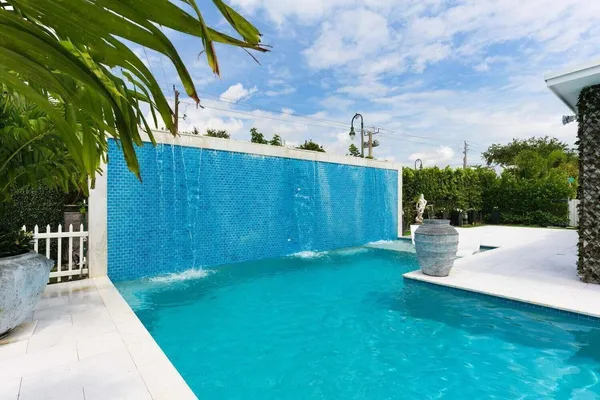 a view of a backyard with garden