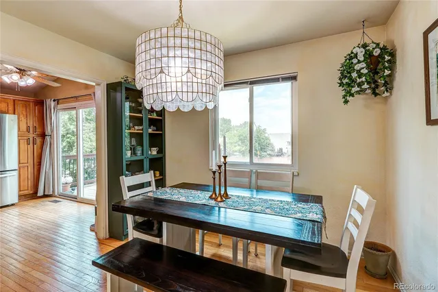 a view of hall way with furniture and window