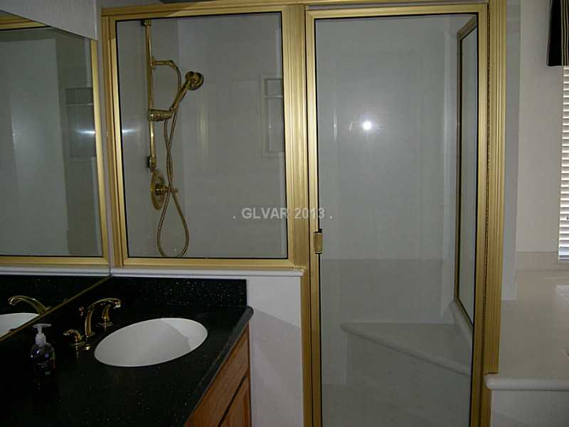 550 Heswall Court Henderson, NV 89014 - Photo 20 of 35 Master Bath/Spa. Large shower with solid surface