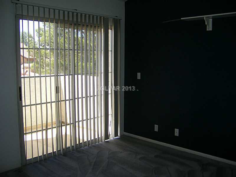 550 Heswall Court Henderson, NV 89014 - Photo 24 of 35 Bedroom. Secondary bedroom with balcony