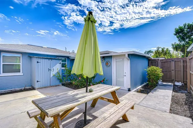 a view of a house with a patio