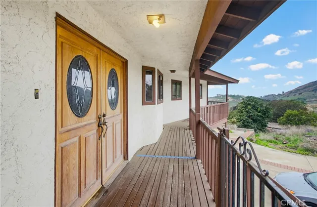 a view of a house with wooden floor and stairs
