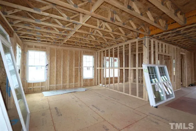 a view of porch with wooden floor