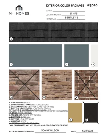 a black and white photo of a living room