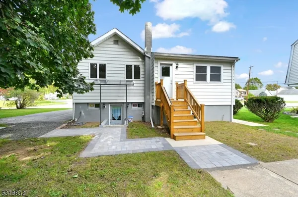 a house view with a garden space