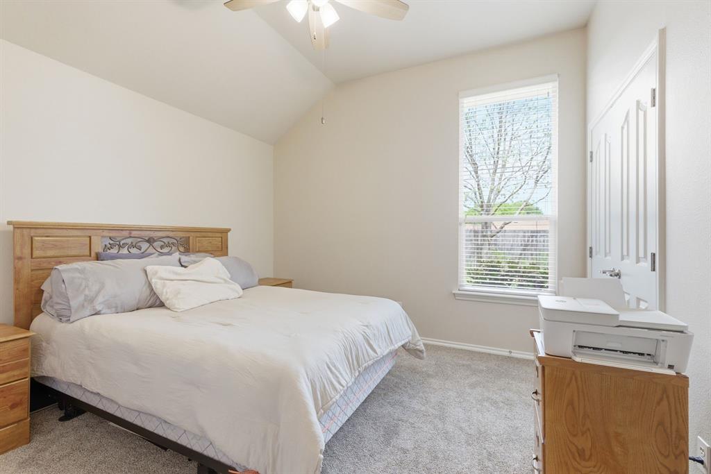 817 Huebner Way Burleson, TX 76028 - Photo 25 of 35 Another bedroom with new carpet, vaulted ceiling and nice window.