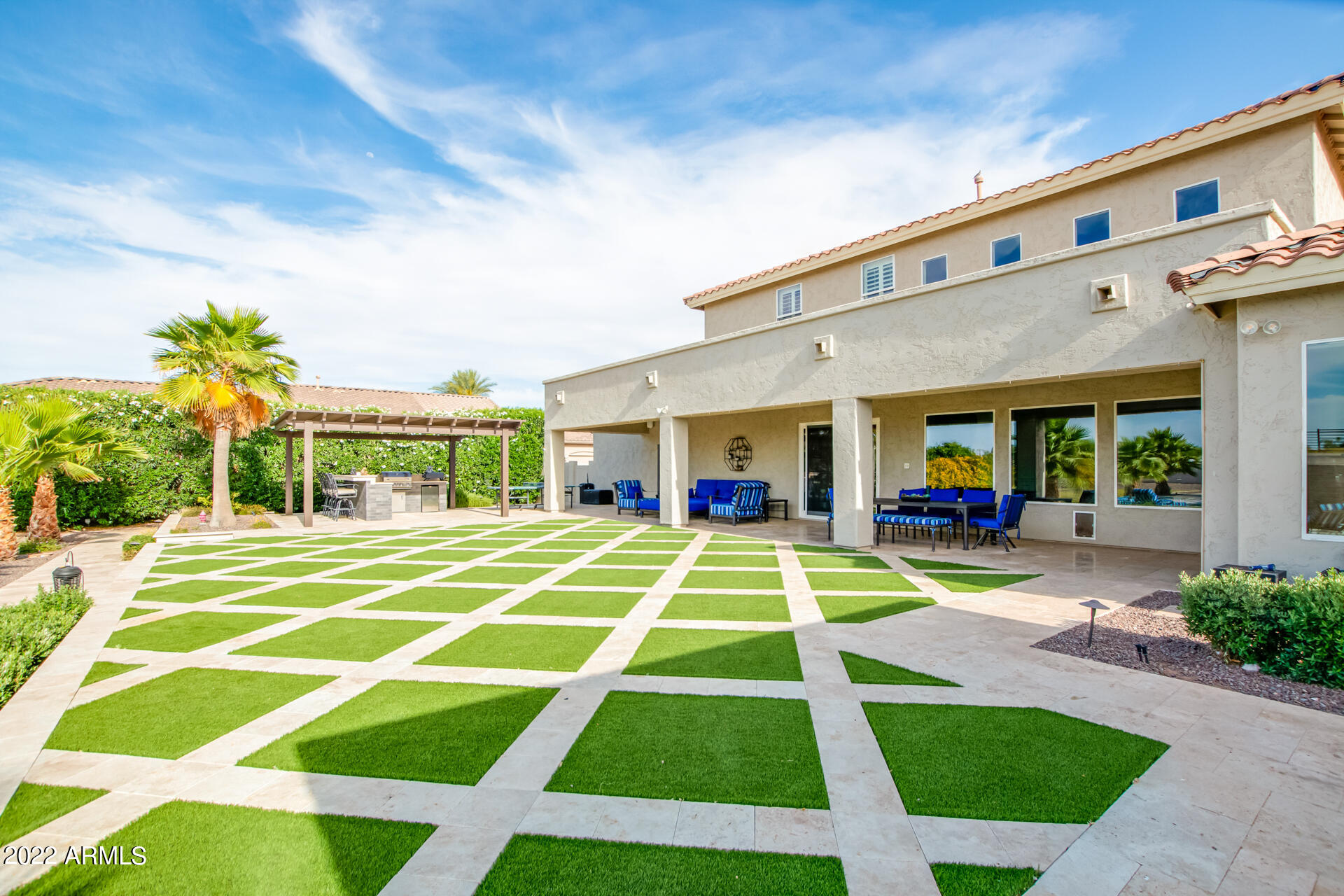 3296 East Vallejo Court Gilbert, AZ 85298 - Photo 105 of 122 Backyard - Turf & Traverntine