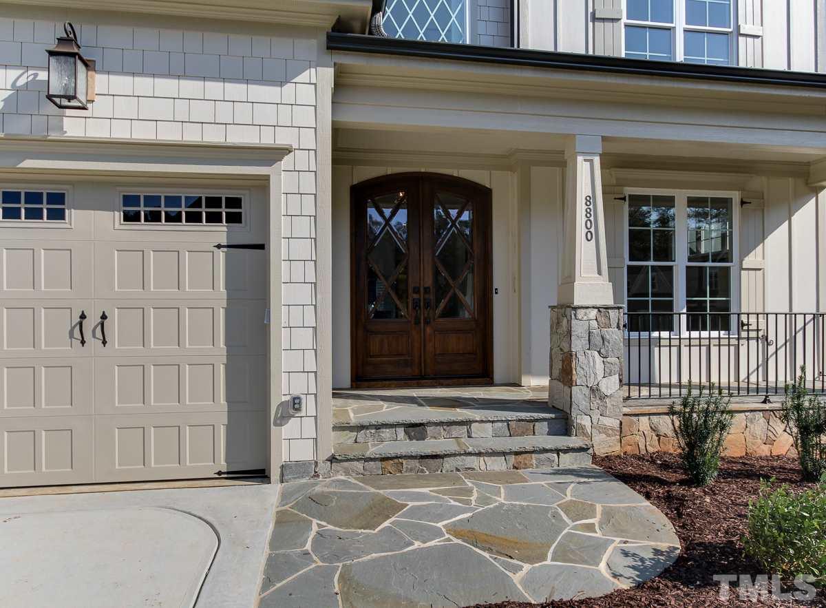 8800 Breeland Way Raleigh, NC 27613 - Photo 2 of 24 a view of a door and a window