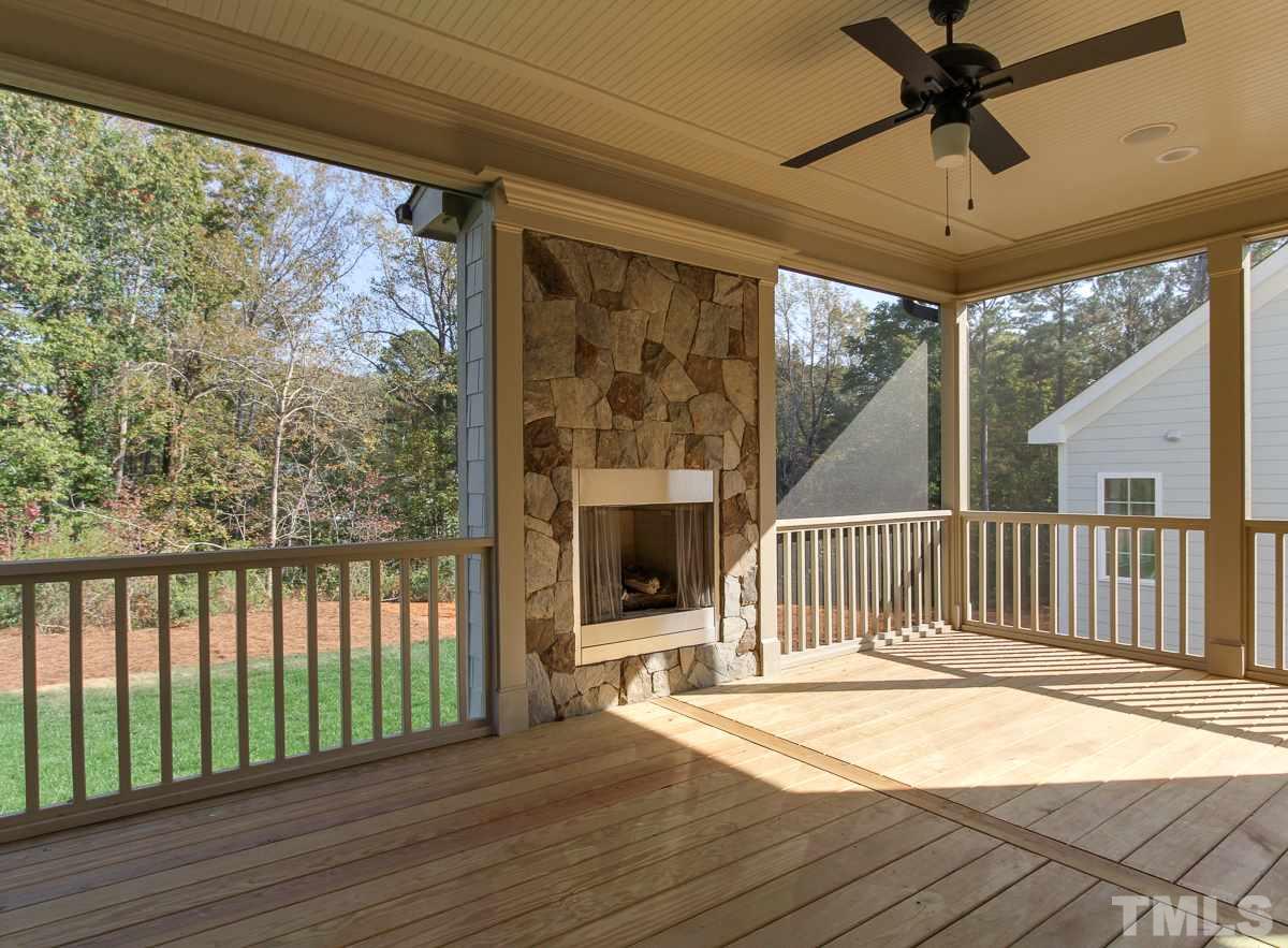 8800 Breeland Way Raleigh, NC 27613 - Photo 22 of 24 a view of a balcony with wooden floor