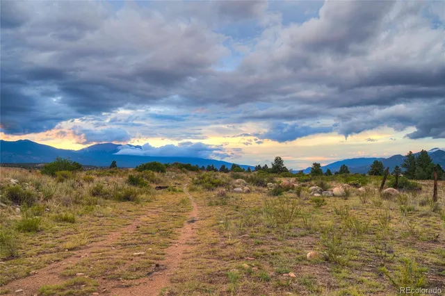 a view of an ocean and a mountain