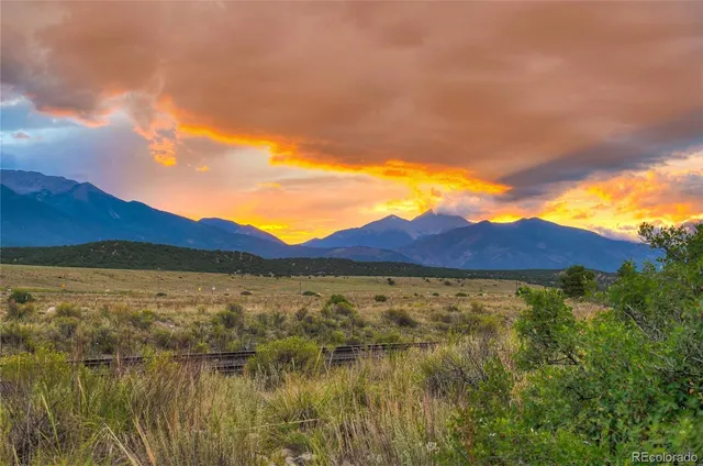 a view of an ocean and a mountain