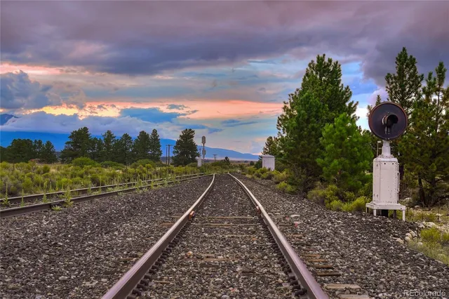 a view of lake with mountain in the background