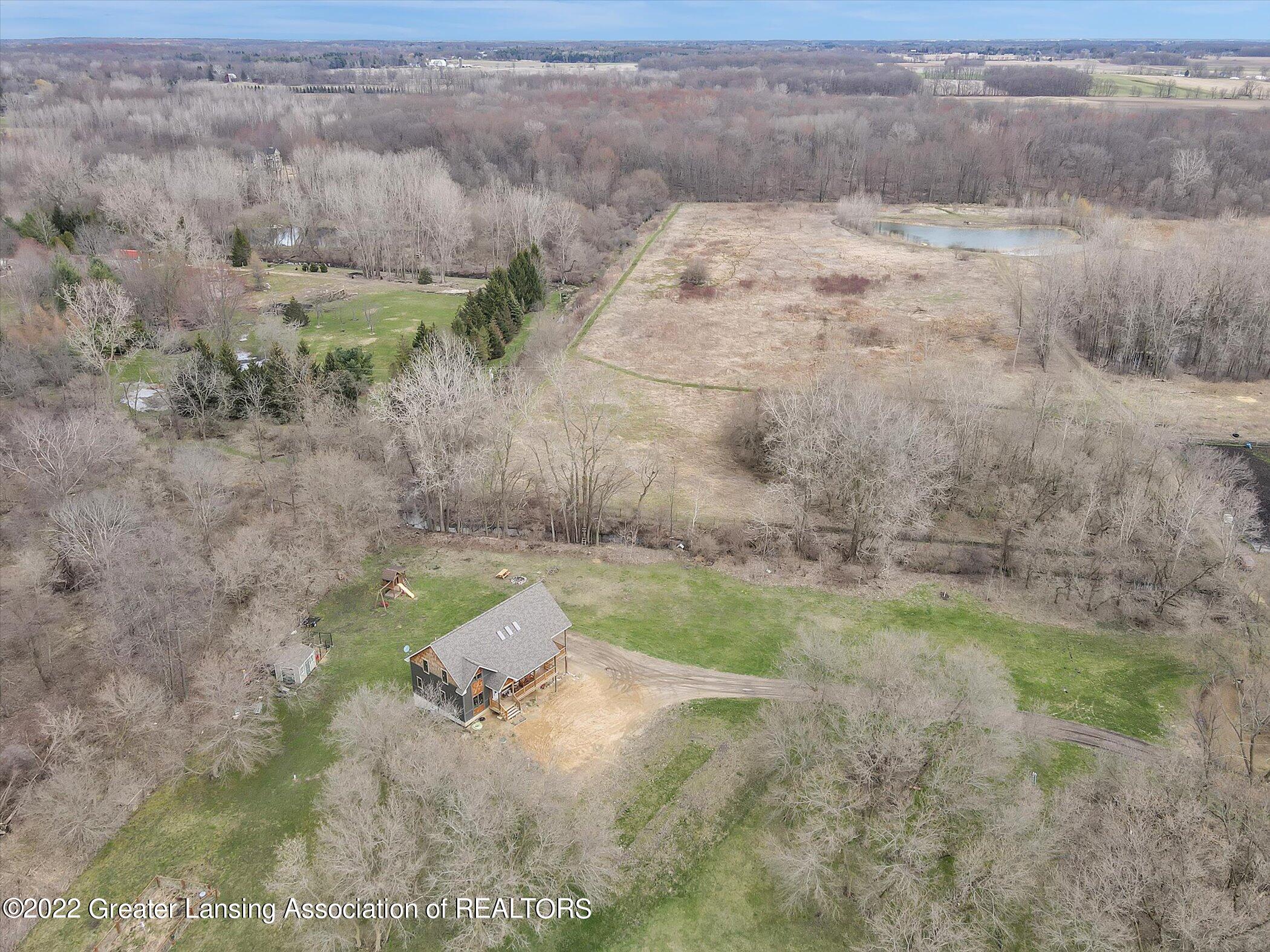 5296 Meridian Road Williamston, MI 48895 - Photo 54 of 62 59-5296-Meridian-Rd-WindowStill-Real-Est