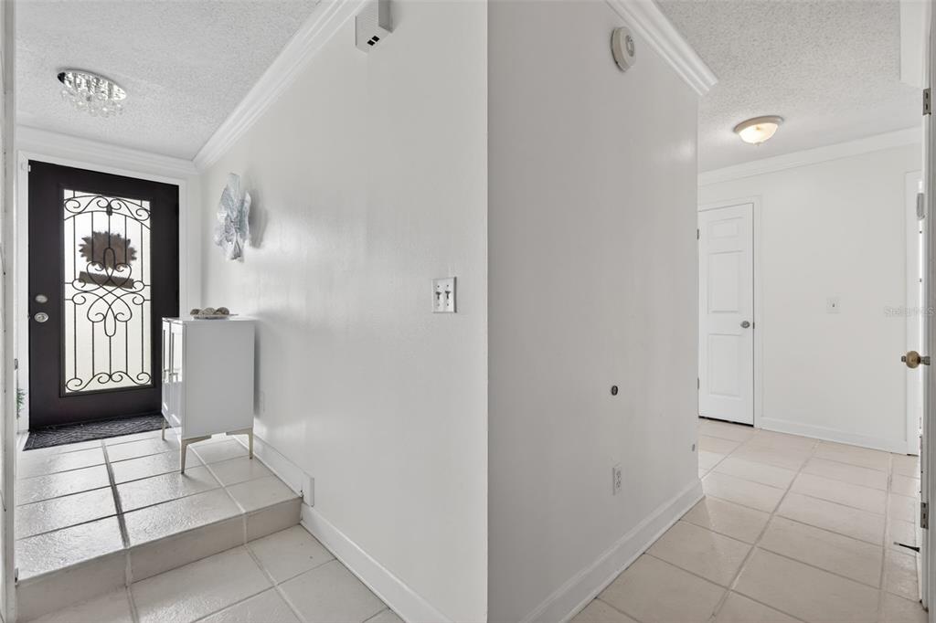 575 Tiberon Cove Road Longwood, FL 32750 - Photo 7 of 56 a view of an entryway with a livingroom