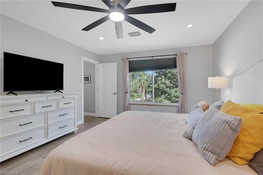 5092 Boxwood Way Naples, FL 34116 - Photo 12 of 48 Large master suite with new oversized fan, recess lighting, and a large walk in closet.
