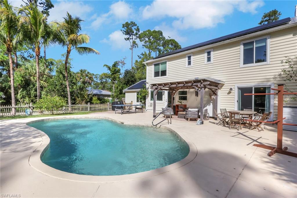 5092 Boxwood Way Naples, FL 34116 - Photo 23 of 48 Beautiful saltwater sports pool with a huge patio for seating, relaxing, and entertaining